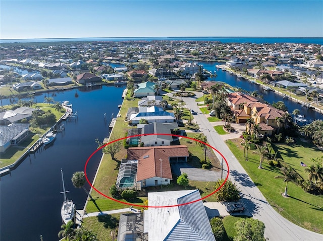 aerial view featuring a water view