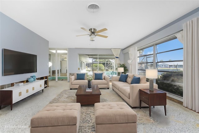 living room featuring ceiling fan