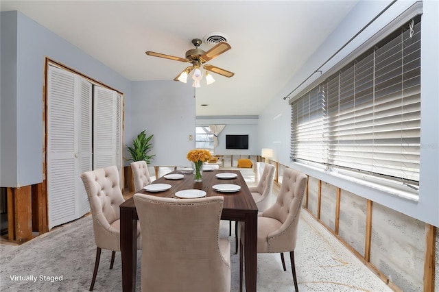 dining room featuring ceiling fan