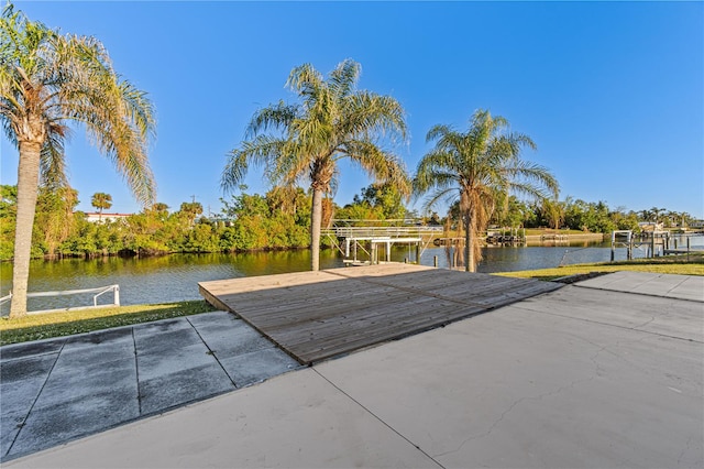 dock area with a water view