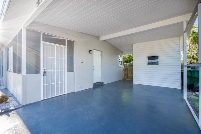 view of patio featuring a carport