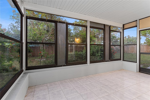 unfurnished sunroom with a healthy amount of sunlight