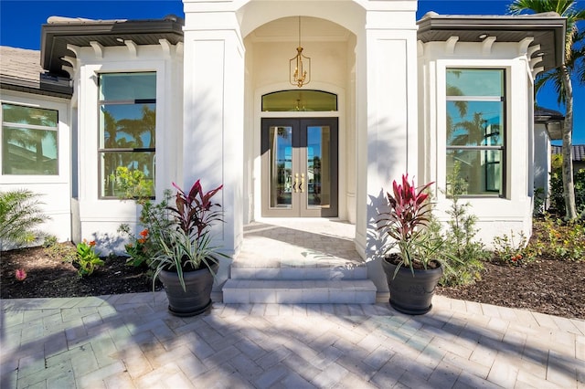 doorway to property featuring french doors