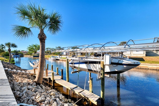 view of dock with a water view