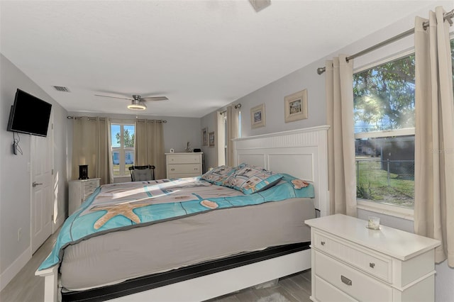 824 E 6th St, Englewood, FL 34223 - bedroom featuring wood finished floors and a ceiling fan