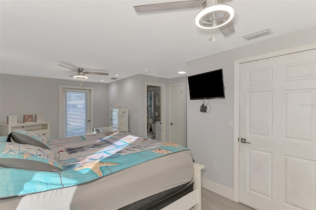 824 E 6th St, Englewood, FL 34223 - bedroom with baseboards and a ceiling fan