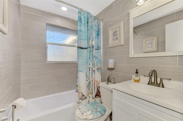 824 E 6th St, Englewood, FL 34223 - full bath featuring tile walls, shower / bath combo, vanity, and backsplash