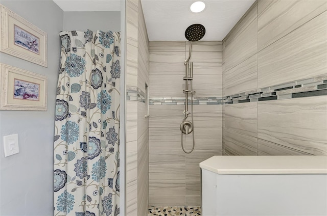 824 E 6th St, Englewood, FL 34223 - bathroom featuring tiled shower and recessed lighting