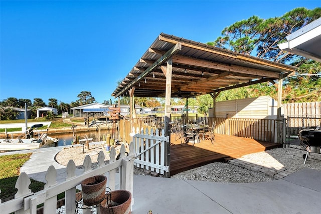824 E 6th St, Englewood, FL 34223 - dock area with a deck with water view