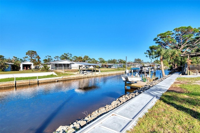 dock area with a water view