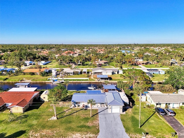 824 E 6th St, Englewood, FL 34223 - aerial perspective of suburban area with a nearby body of water