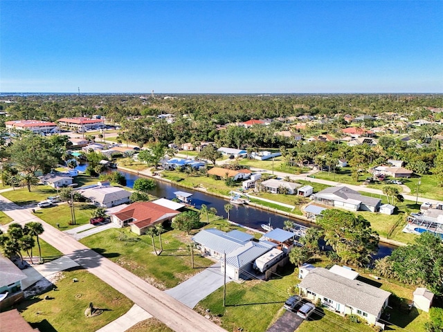 824 E 6th St, Englewood, FL 34223 - aerial view of residential area with a large body of water
