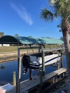 view of dock with a water view