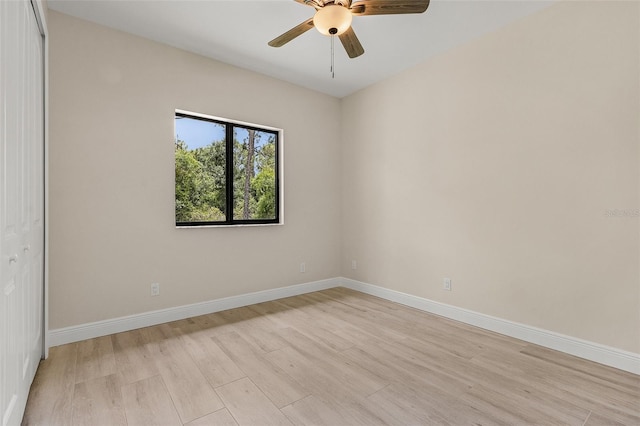 unfurnished room with ceiling fan and light hardwood / wood-style floors