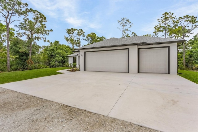 garage featuring a yard