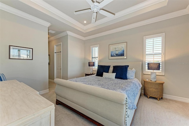 bedroom with multiple windows, light colored carpet, ceiling fan, and crown molding