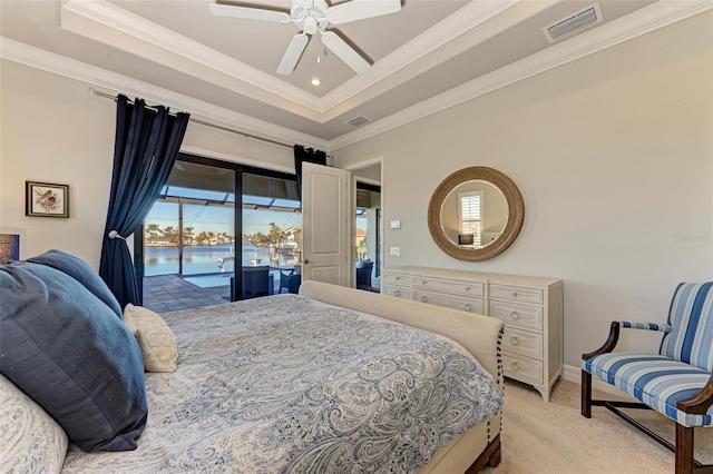 bedroom with ceiling fan, access to outside, light carpet, a water view, and ornamental molding