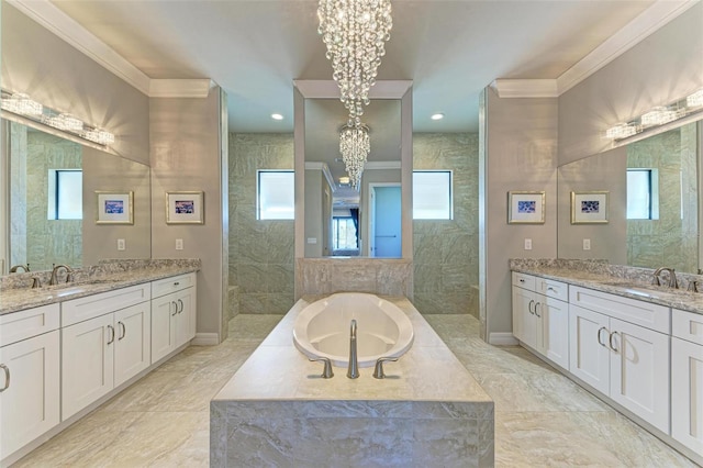 bathroom with vanity, a healthy amount of sunlight, crown molding, and an inviting chandelier