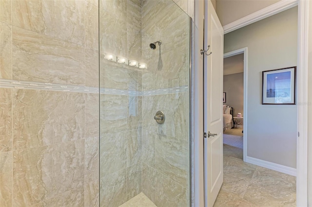 bathroom featuring a tile shower