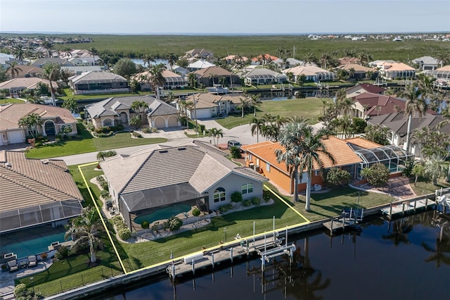 drone / aerial view with a water view