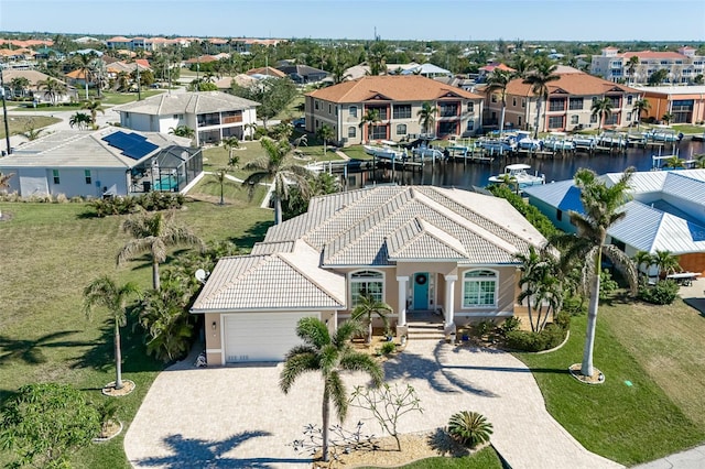 bird's eye view with a water view