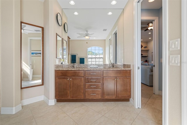 bathroom featuring tile patterned floors and vanity