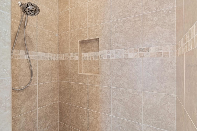 room details with a tile shower