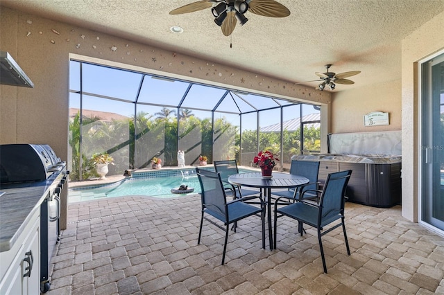 view of patio / terrace with glass enclosure, a mountain view, ceiling fan, and a pool with hot tub