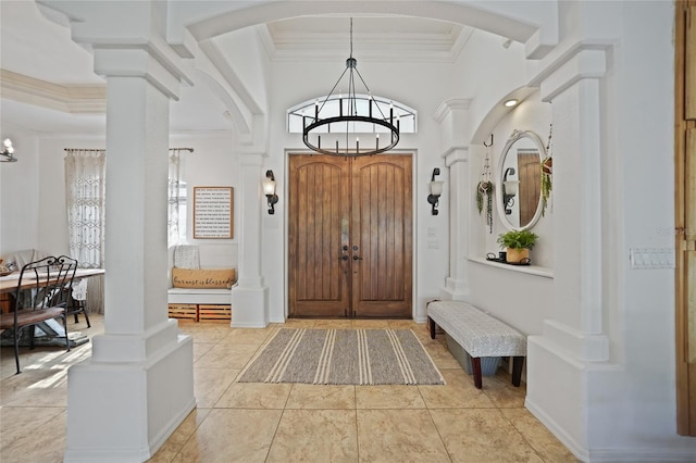 17080 Kellog Ave, Port Charlotte, FL 33954 - entrance foyer with ornamental molding and a chandelier