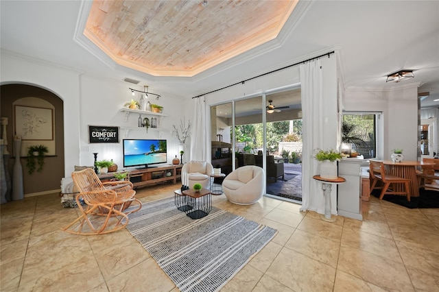 17080 Kellog Ave, Port Charlotte, FL 33954 - living area featuring ornamental molding, a raised ceiling, wood ceiling, arched walkways, and tile patterned flooring