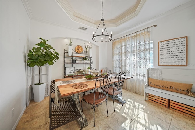 17080 Kellog Ave, Port Charlotte, FL 33954 - dining area with ornamental molding, a chandelier, and a tray ceiling