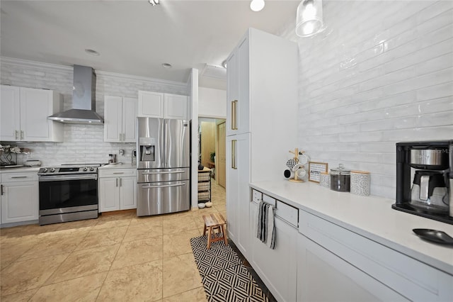 17080 Kellog Ave, Port Charlotte, FL 33954 - kitchen featuring appliances with stainless steel finishes, wall chimney range hood, light countertops, and decorative backsplash