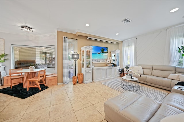 17080 Kellog Ave, Port Charlotte, FL 33954 - tiled living area featuring crown molding and recessed lighting