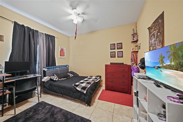 17080 Kellog Ave, Port Charlotte, FL 33954 - bedroom featuring light tile patterned floors, an office area, and ceiling fan