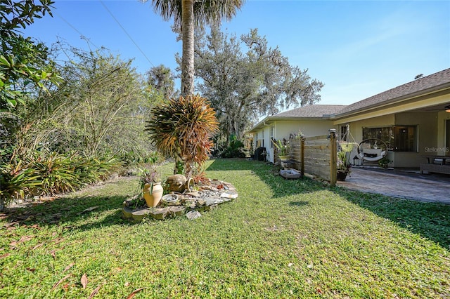 17080 Kellog Ave, Port Charlotte, FL 33954 - view of green lawn with a patio area