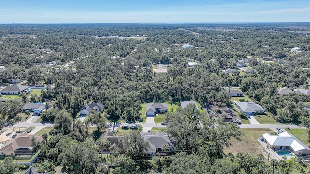 17080 Kellog Ave, Port Charlotte, FL 33954 - aerial overview of property's location featuring nearby suburban area and a forest