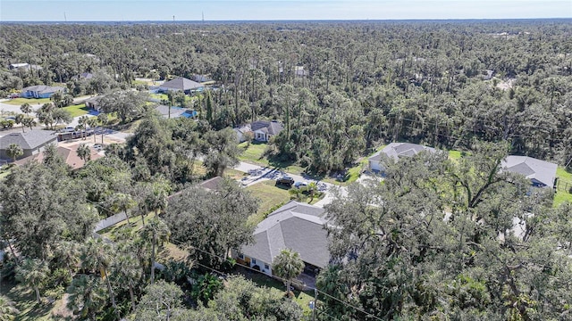 17080 Kellog Ave, Port Charlotte, FL 33954 - aerial overview of property's location with a heavily wooded area and nearby suburban area