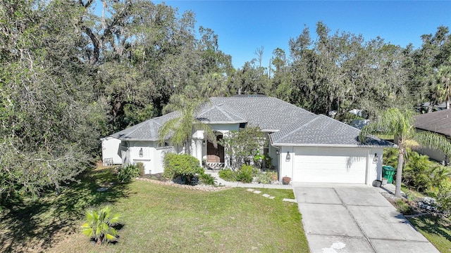 17080 Kellog Ave, Port Charlotte, FL 33954 - single story home with a front lawn, an attached garage, driveway, stucco siding, and a shingled roof