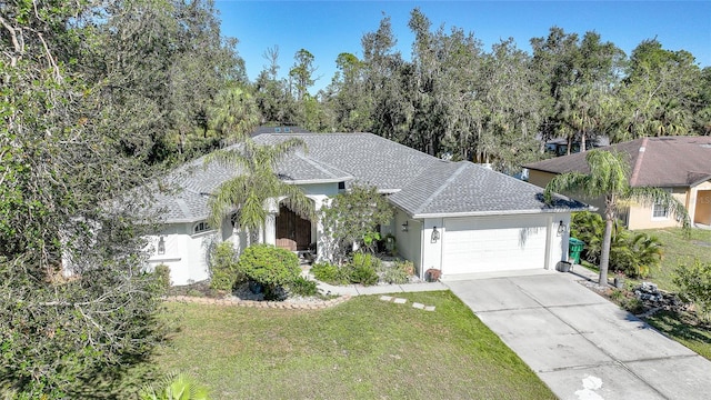17080 Kellog Ave, Port Charlotte, FL 33954 - single story home featuring a garage, a front lawn, driveway, and stucco siding
