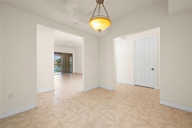 unfurnished room featuring light tile patterned flooring