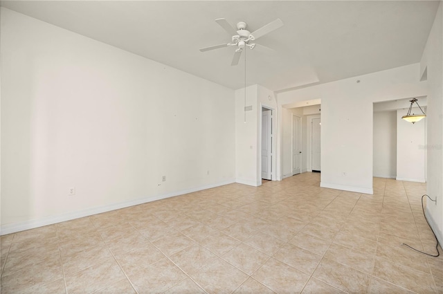 unfurnished room with ceiling fan