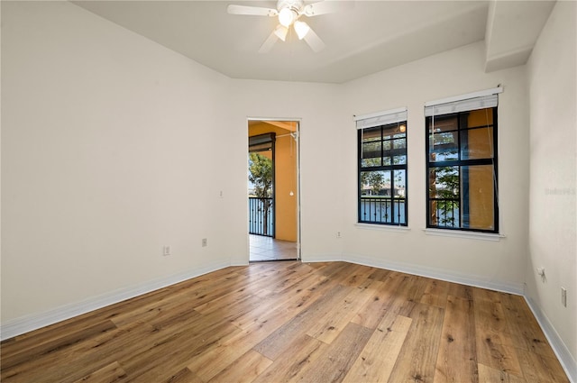 spare room featuring ceiling fan and light wood-type flooring