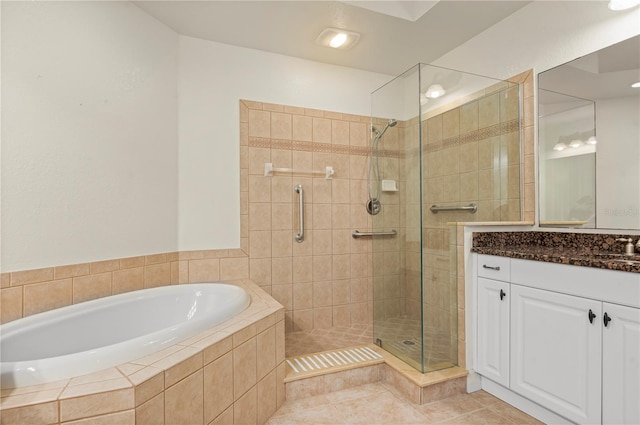 bathroom with separate shower and tub, tile patterned floors, and vanity