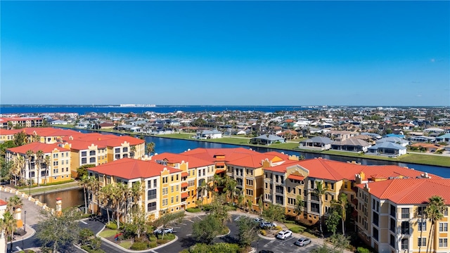 drone / aerial view with a water view