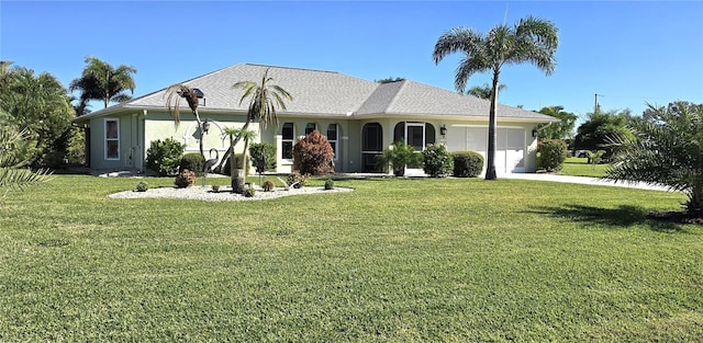 ranch-style house with a garage and a front lawn