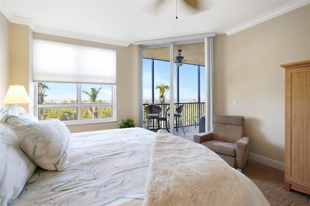 carpeted bedroom featuring access to outside, ceiling fan, and ornamental molding