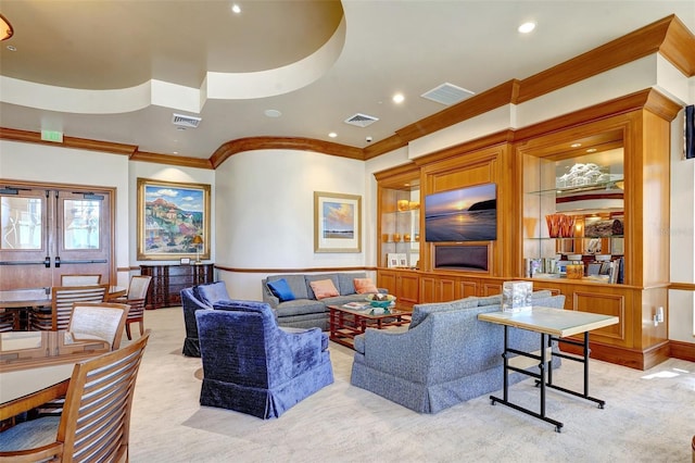 carpeted living room with crown molding