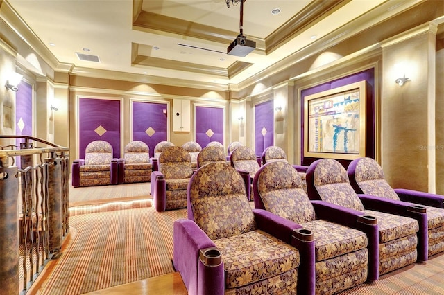 home theater room featuring crown molding and a tray ceiling