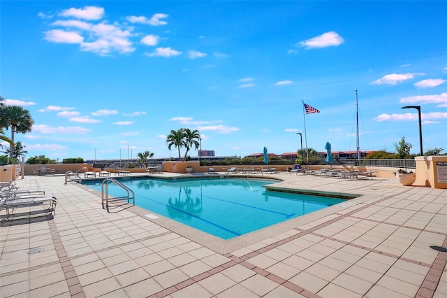 view of pool featuring a patio