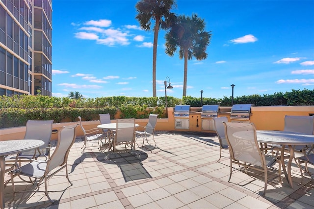 view of patio with a grill and exterior kitchen